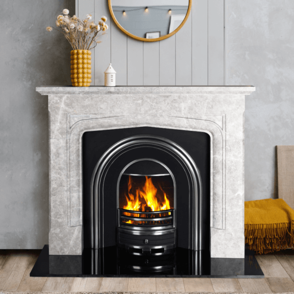 The 54" Alexander Nimbus Grey marble surround combines clean lines with strong architectural detail for elegant homes. Pictured here in an elegant grey and clouded white with black Mourne cast Iron inset & Polished Black Granite Hearth