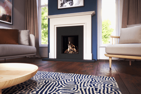 The Global 55XT is pictured here with a black interior, elegant black insert and white marble surround. The flames are enclosed in authentic wood-effect ceramic logs. This causes the flames to gently lap around them, creating a completely realistic flame effect.