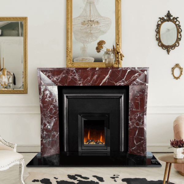 The 54" Edge Crimson Sky marble surround combines clean lines with strong architectural detail for elegant homes. This eye catching surround is pictured in a crimson and white veined marble, featuring a black back plate and insert Bray stove in black, all resting on an elegant black granite hearth