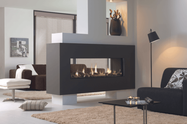 A superior, see-through gas fire, The Metro 150XT Tunnel Eco Wave is a see-through, room dividing gas fire. It is 1.5 metres wide and features a fire bed of dazzling logs set off by a border of Carrara stones. The interior is in mirrored Ceraglass, creating visual depth to the flame picture