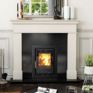 The ECO C400 Multi fuel Cassette stove from Elegant Fires is manufactured from steel construction. Pictured here in black set into a black granite insert and a white stone fireplace surround and black granite hearth.