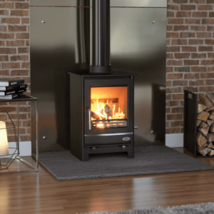With a sleek and clean design the Henley Hampshire is classic addition to any room, Pictured here in black with matching pipe work and large viewing window and blaxing fire within. The Hampshire is pictured set on a black slate hearth and set against a chrome feature back plate