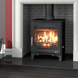 The classic design free standing Sherwood stove from Elegant Fires. Pictured here in black with a chrome handle and matching black pipe work. Pictured on a black granite hearth set into a grey brick chamber with a white marble fireplace surround