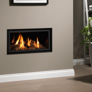 This glass fronted gas fire is shown here installed with the Ravel 800 Edge trim directly into a fireplace wall for a minimalistic look.
