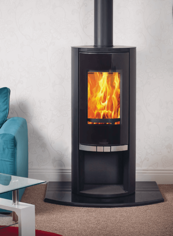 Black 7kW Freestanding Stove with log store and view of lit fire through the sizable viewing window