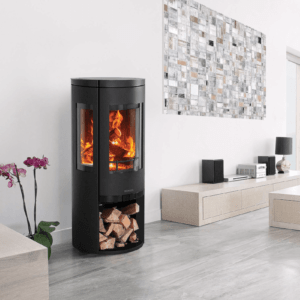 A contemporary design black 6kW Freestanding Stove coupled with a practical log-box feature.