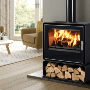 The Orion range pictured here in black combines the sleek lines of a cassette with the presence of a freestanding stove. The Orion is pictured with a full logstore and flaming fire behind the large viewing