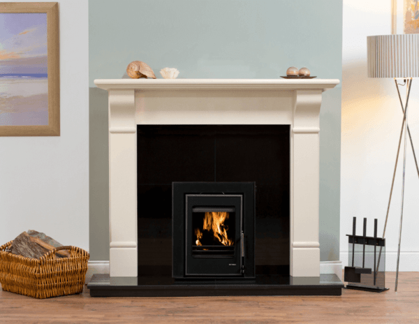 The Elegant Fires Napoli, Ivory Pearl Surround. Also available in Perla White. Pictured with a black granite hearth, back panel and black Vitae 6kW Cassette Stove.
